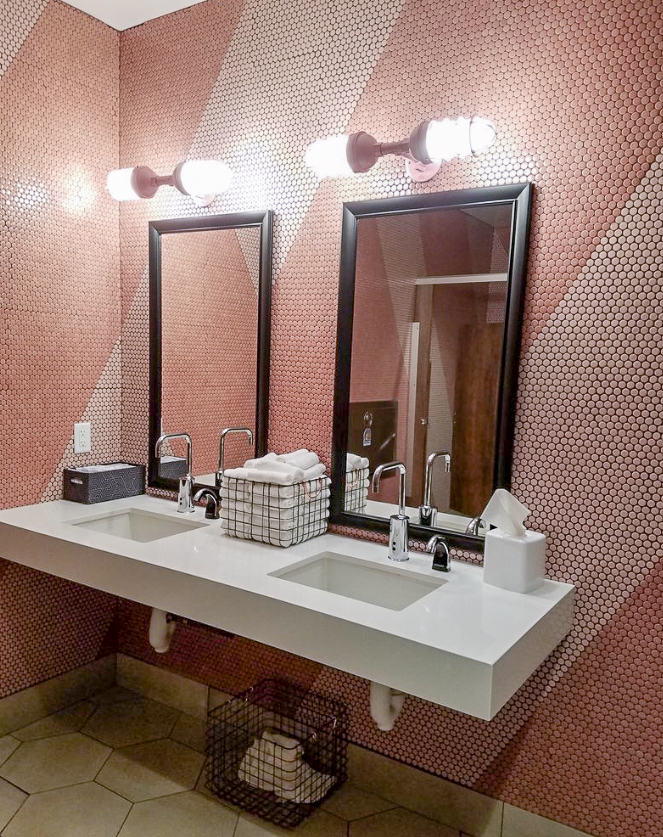 pink penny round tile bathroom