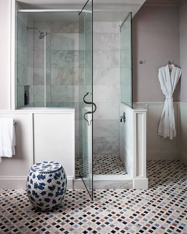 Elegant mauve bathroom with multi-color tile