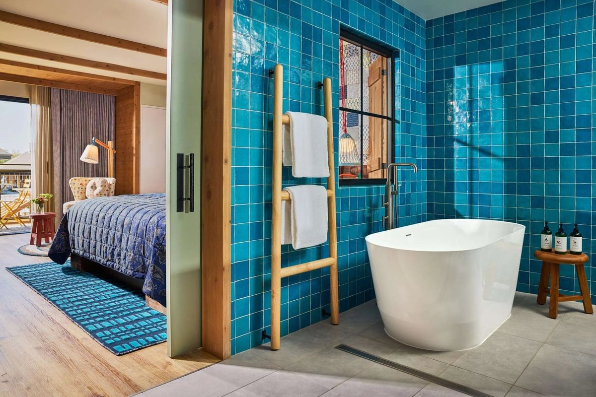Cev Paloma in Topaz Blue Glossy Zellige Look Tile Installed in guest bathroom at Treehouse Hotel in Sunnyvale, CA